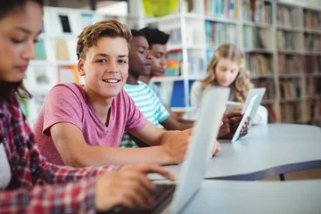 Students working together in a school library